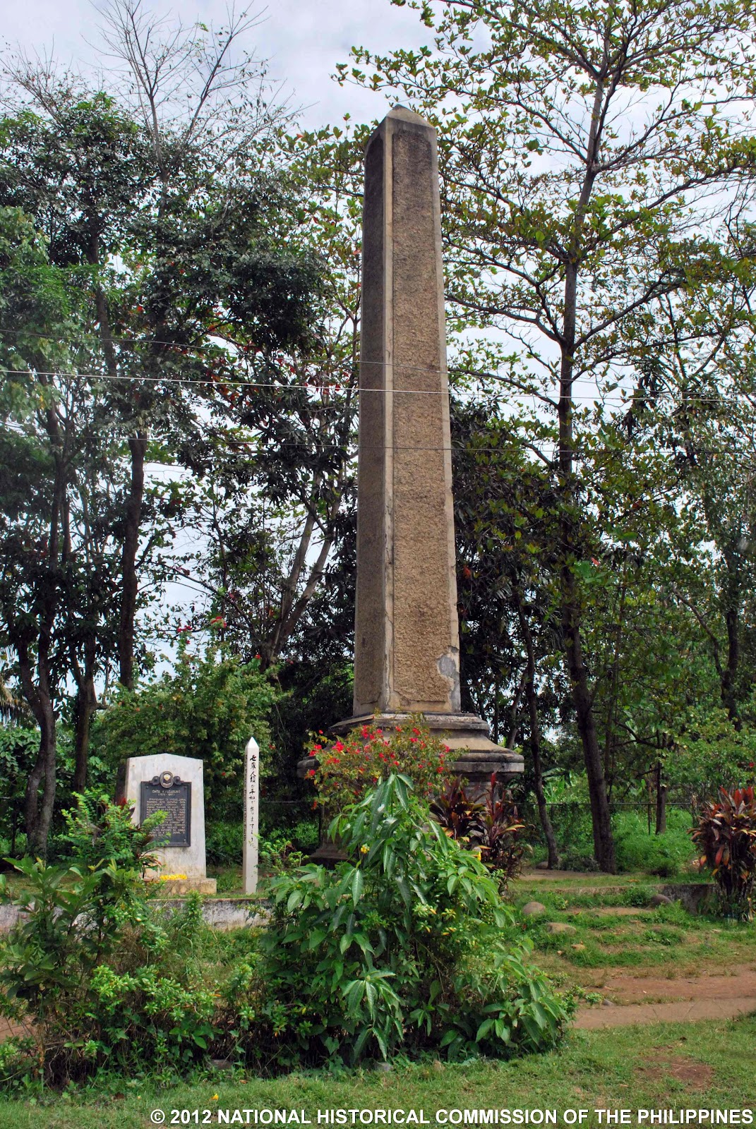 Ohta memorial. A memorial obelisk built in honor of Ohta Kyosaburu who invoked the Public Land Act #926 of 1903 (Mintal Elem. Sch.)